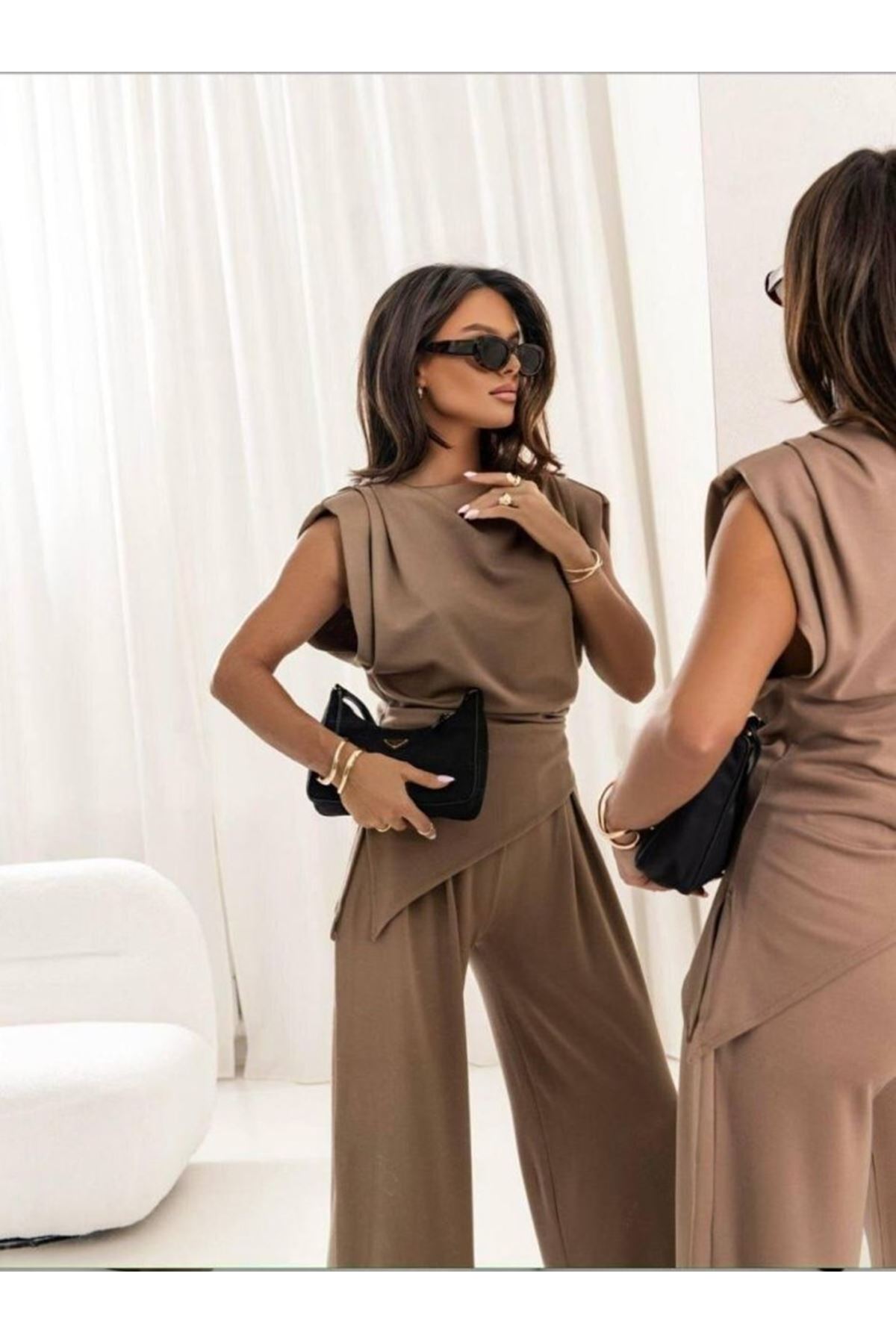 Kadın Dalgıç Kumaş Sıfır Kol Bluz Ve Bol Kesim Pantolon Ikili Takım