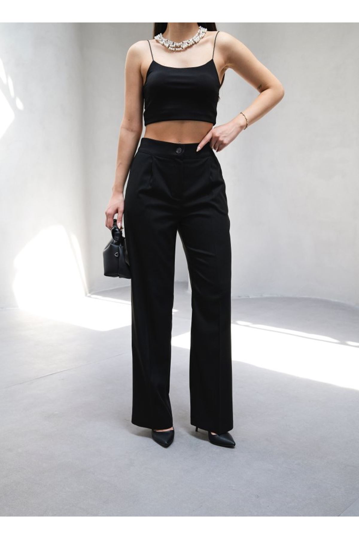 Arkasi Lasti̇kli̇ Pi̇leli̇ Dökümlü Wide Leg Pantolon