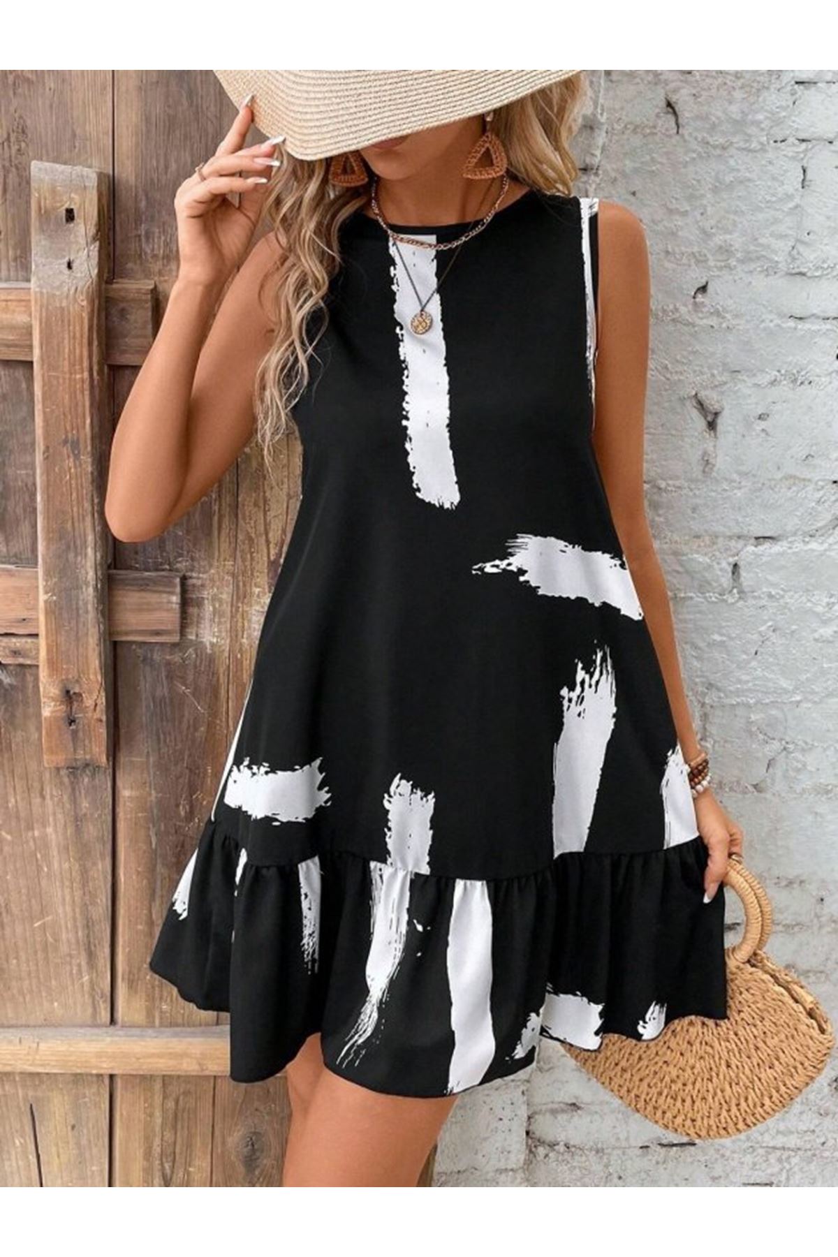 Kadın Kolsuz Bisiklet Yaka Arkadan Fiyonklu Süprem Kısa Elbise