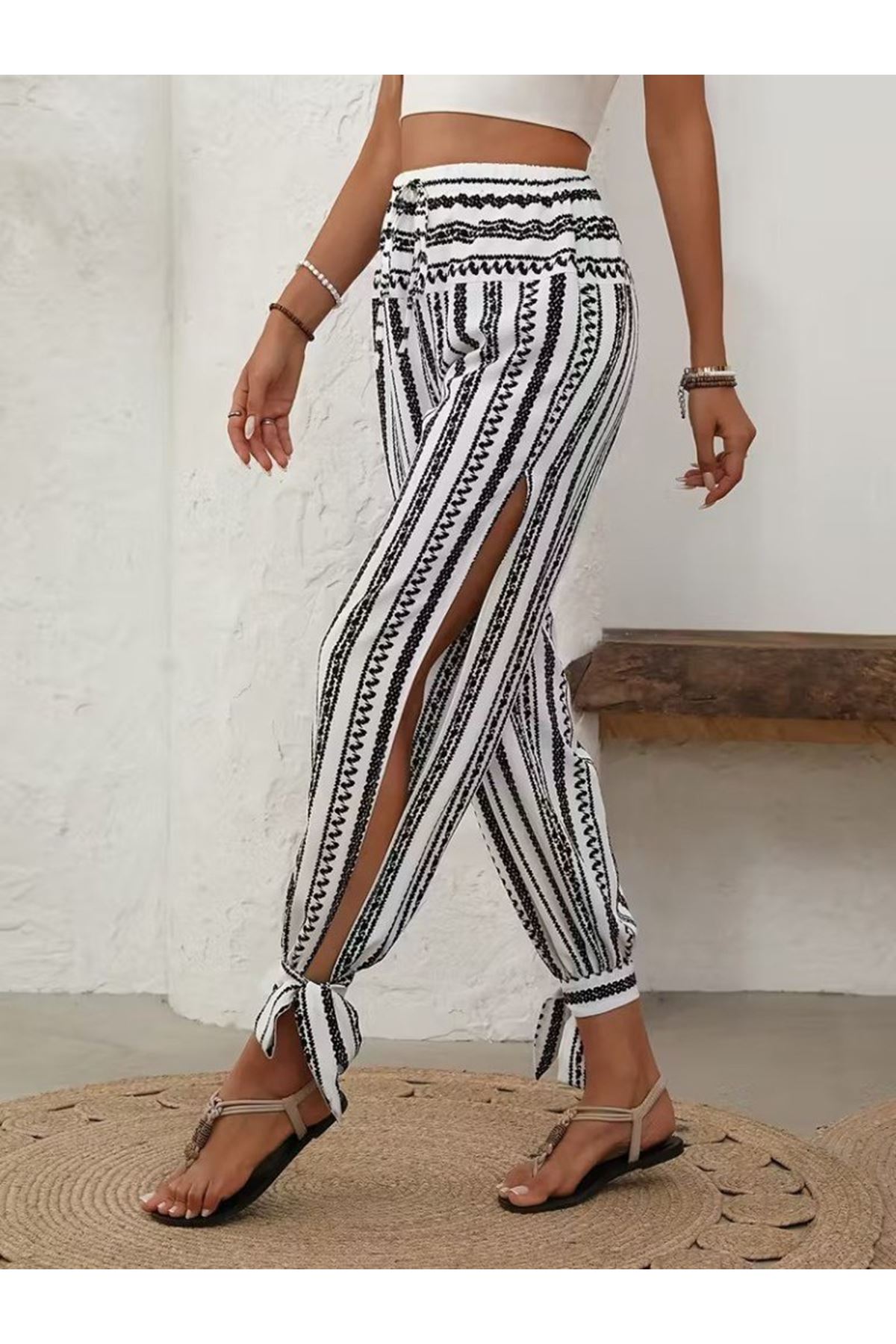 Kadın Yüksek Bel Desenli Paçadan Bağlamalı Yanları Yırtmaçlı Süprem Pantolon