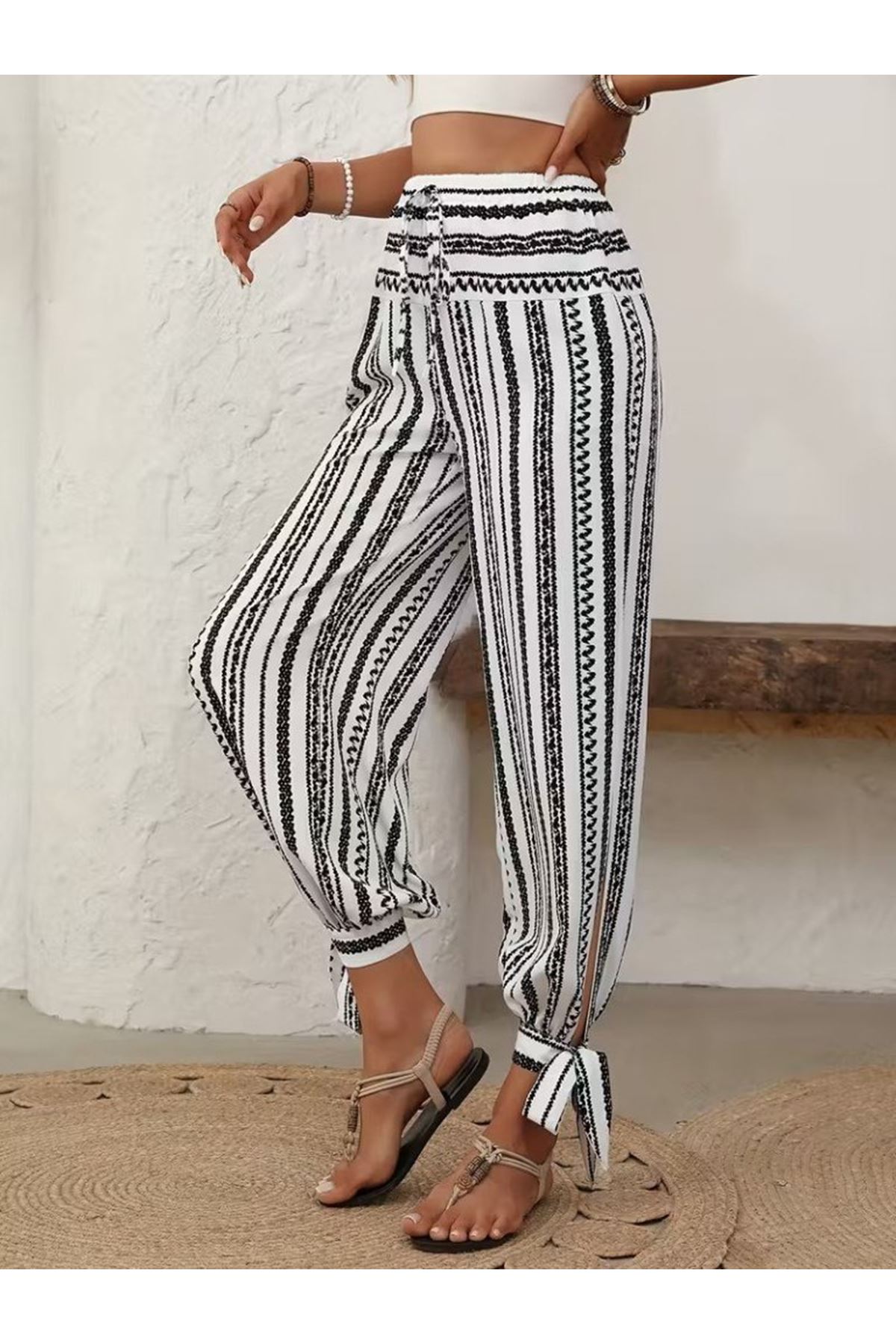 Kadın Yüksek Bel Desenli Paçadan Bağlamalı Yanları Yırtmaçlı Süprem Pantolon