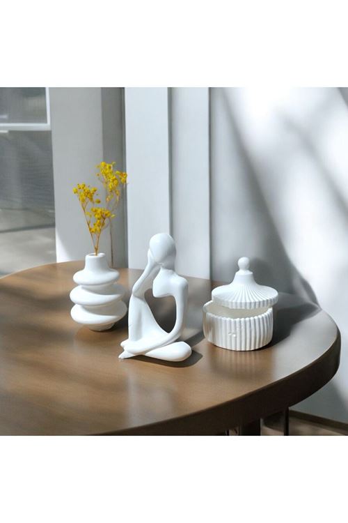 "Modern Sanatın Zarif Dokunuşu: Düşünceli Figür Dekor Seti"